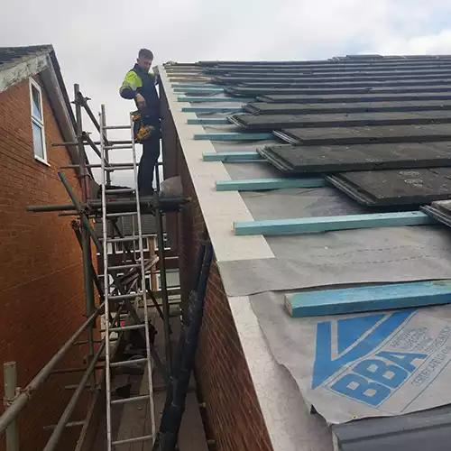 roof tiles being installed